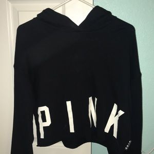PINK cropped sweatshirt with laced sleeves.